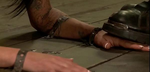  Shackled and gagged sub gets whipped